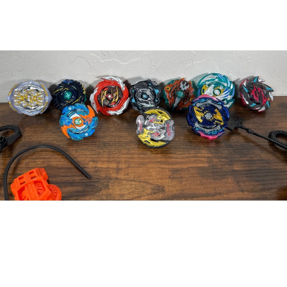 Beyblade Burst Lot 10 Spinning Tops and 4 Launchers Hasbro Takara Tomy Set - Picture 2 of 2